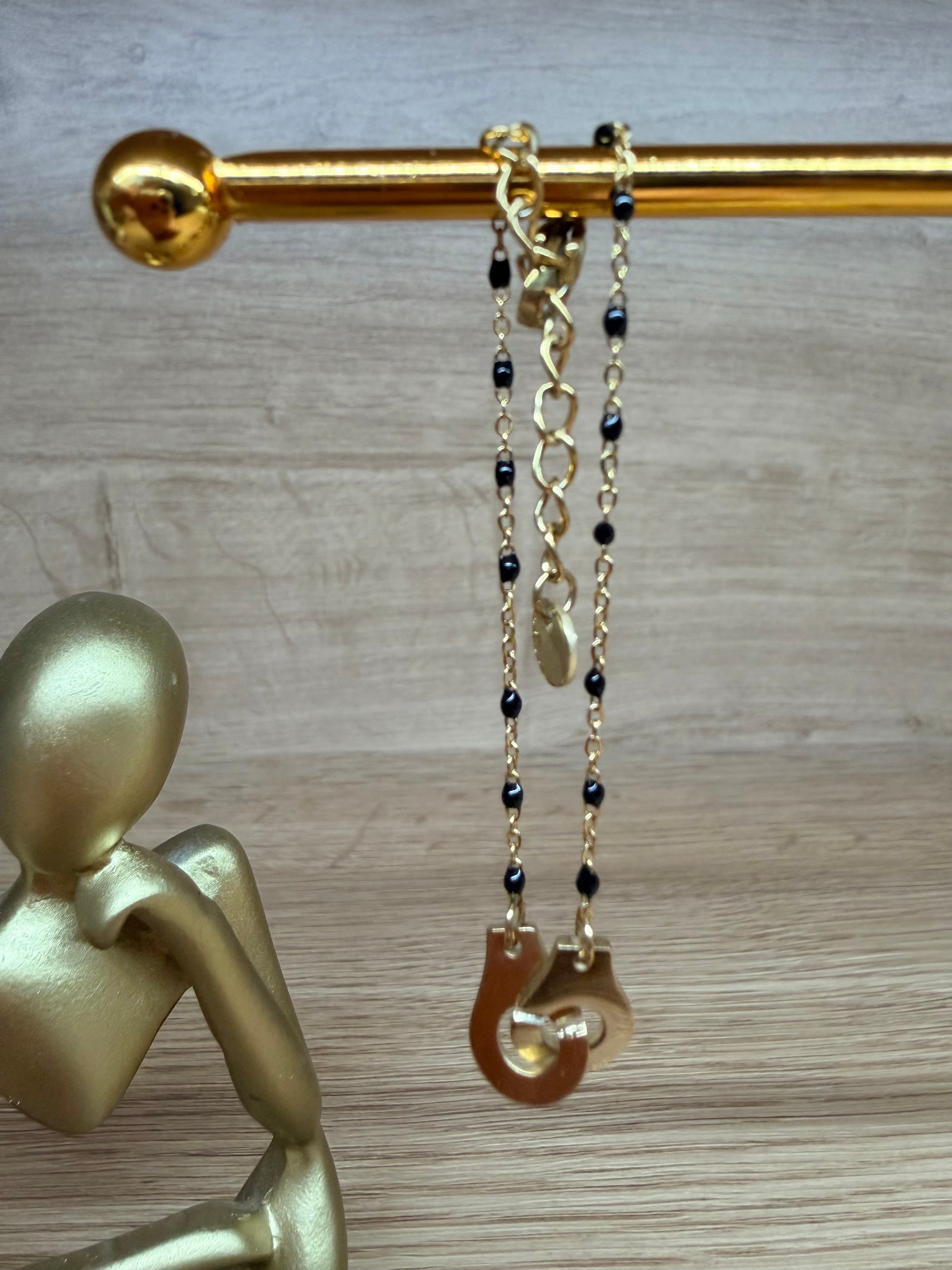 Bracelet Chaîne Acier Inoxydable Doré - Pendentif Menottes et Perles Noires